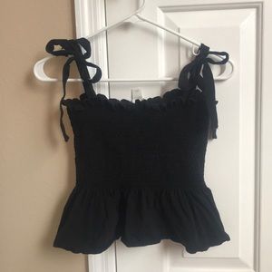Ruched black tank with tie straps, worn once.